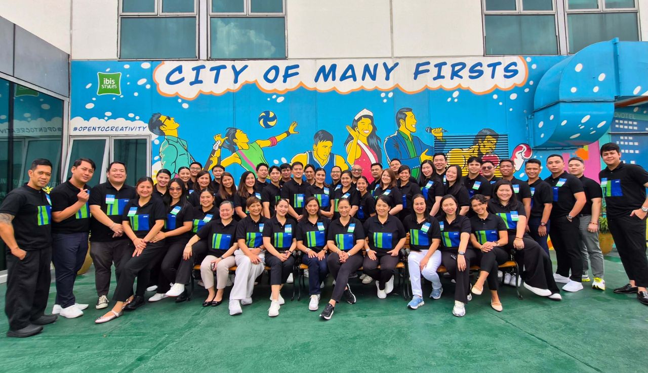 Araneta Hotels team gathered outside at a planning event