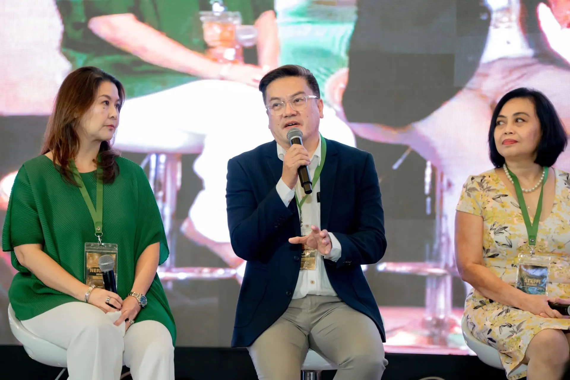 Coach AJ speaking on an industry panel