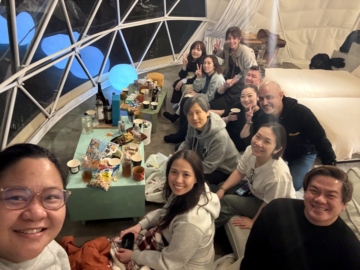 People together around a table in the Swissôtel Osaka photo collection